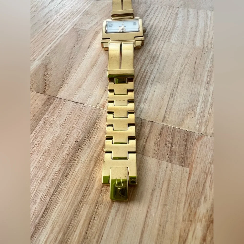 Rare Bulova ladies rectangular gold tone diamond dress watch NEW BATTERY